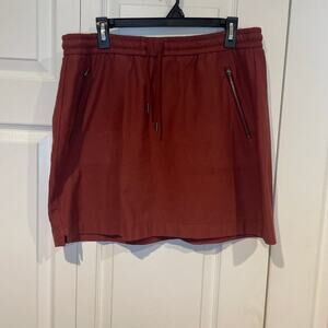 Athleta dark burnt orange soft skirt.
